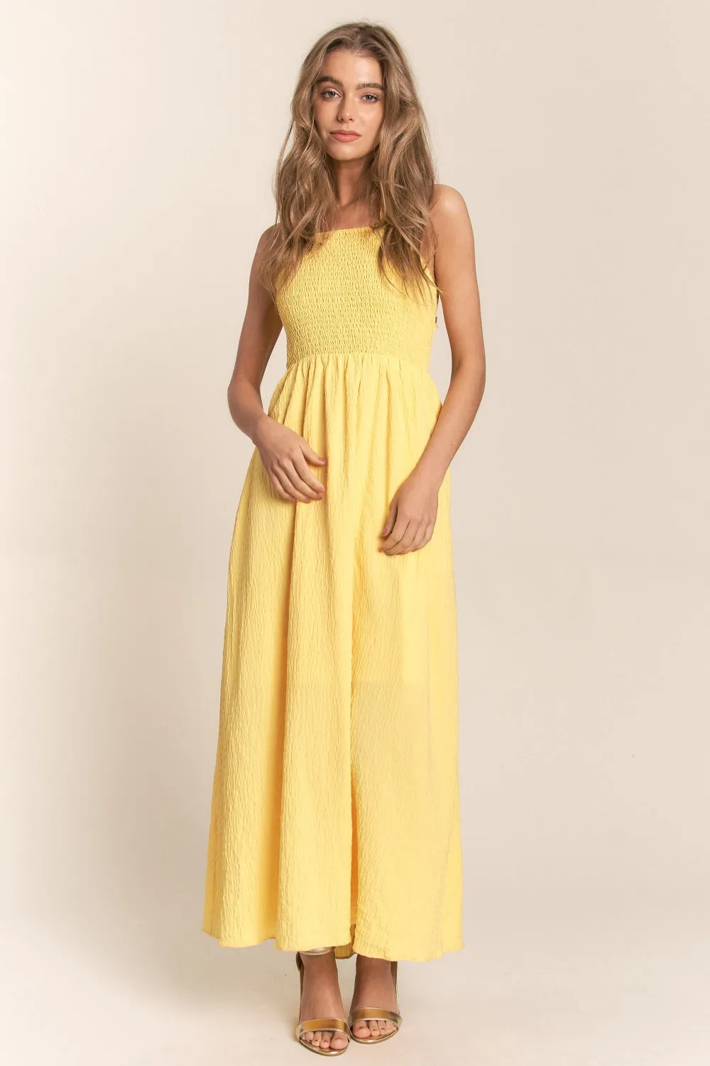 Sunny Sky’s Crisscross Back Tie Smocked Maxi Dress