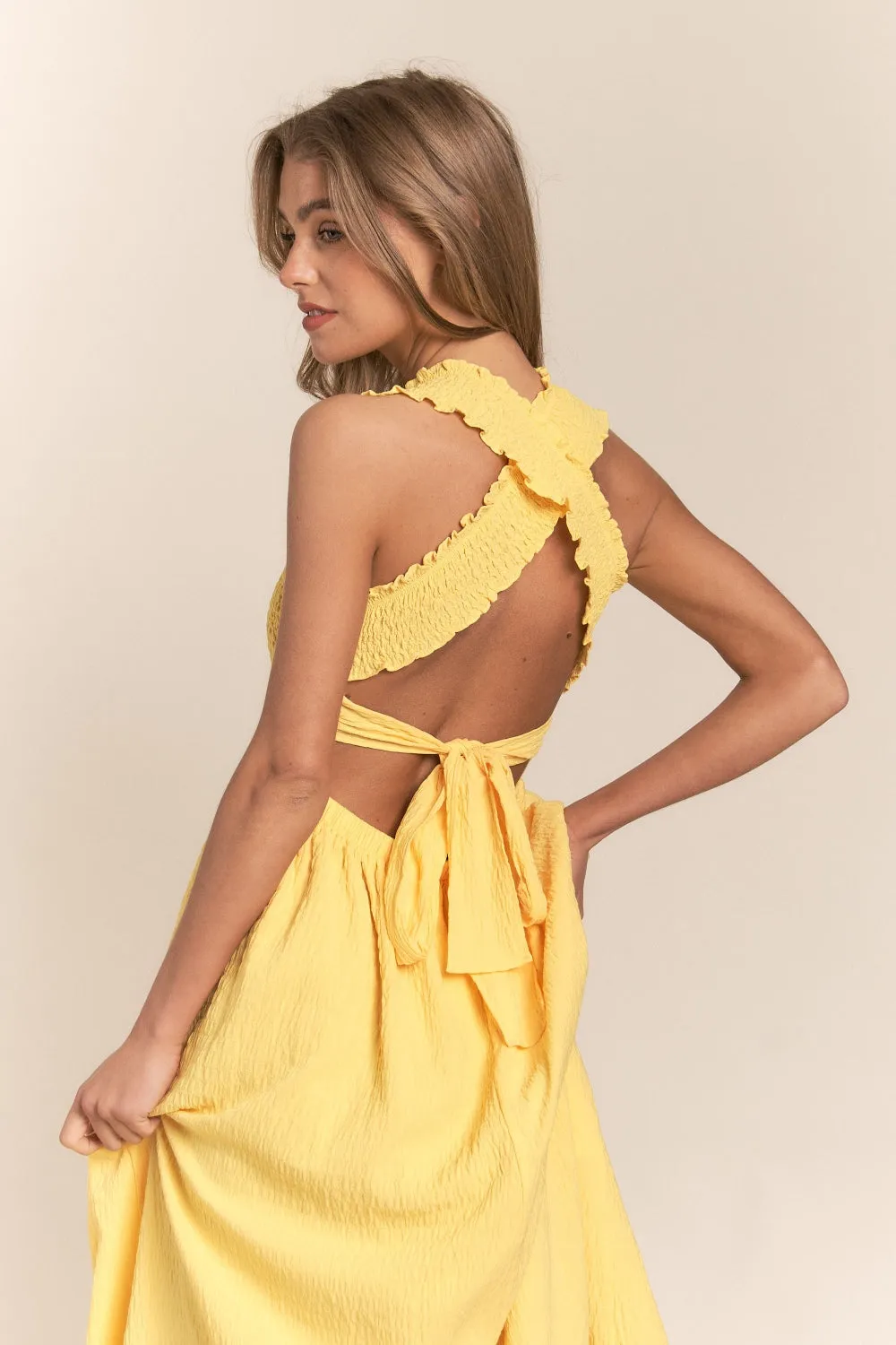 Sunny Sky’s Crisscross Back Tie Smocked Maxi Dress