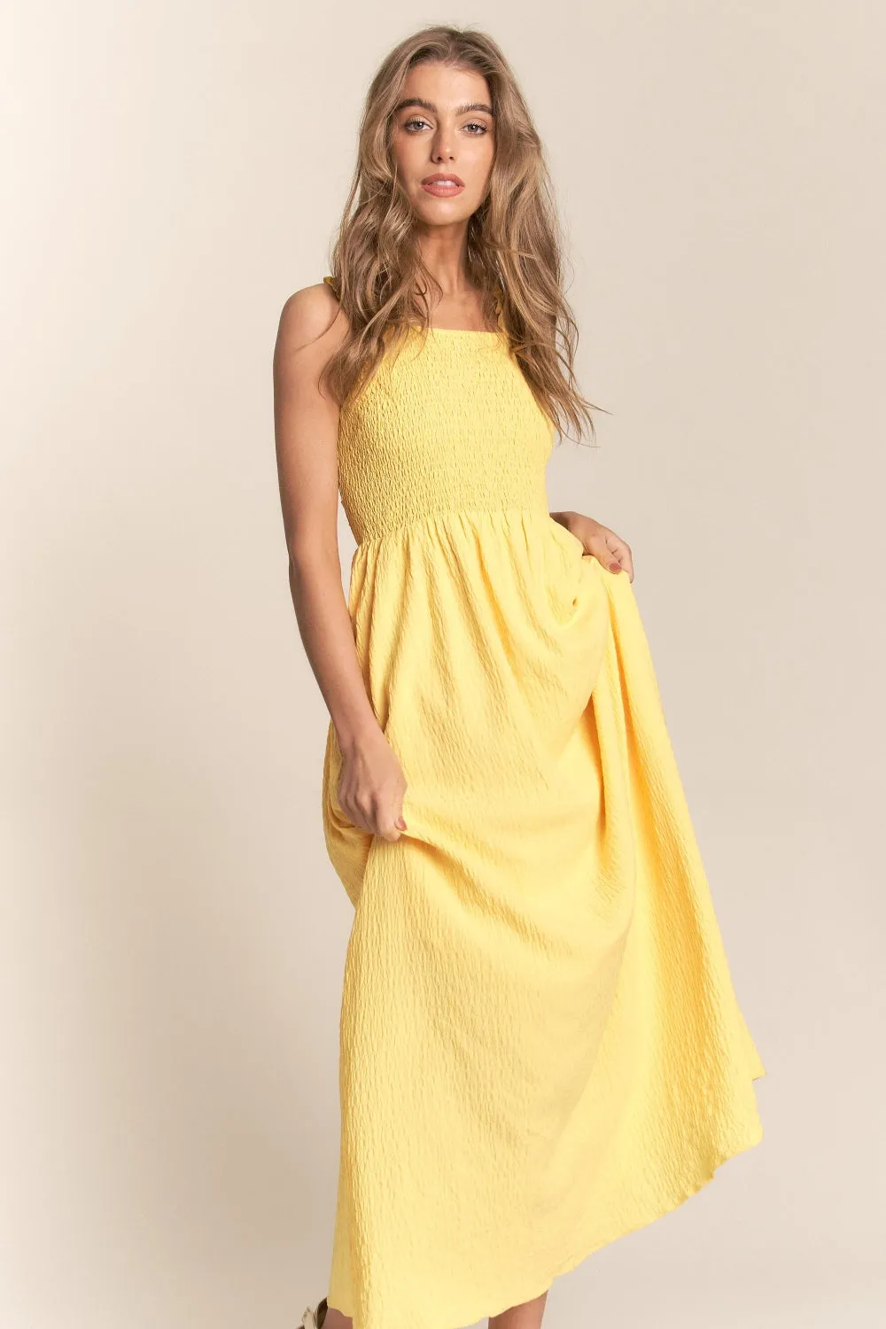 Sunny Sky’s Crisscross Back Tie Smocked Maxi Dress